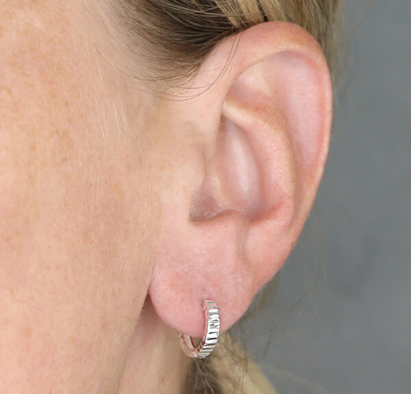 Small everyday Sterling Silver hoops with diamond cut finish